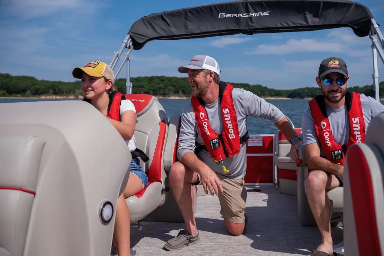 A captain teaching students aboard a boat on Lake Texoma